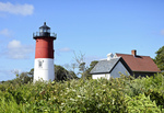 Surrounding%20area%20landmarks%20Nauset%20Lighthouse.%20Located%20within%20the%20Cape%20Cod%20National%20Seashore%2C%20Nauset%20Light%20is%20one%20of%20the%20most%20famous%20lighthouses%20on%20the%20east%20coast.%20Originally%20built%20in%201887%2C%20it%20was%20moved%20to%20Eastham%20from%20Chatham%20in%201923%20to%20replace%20the%20Three%20Sisters.%20The%20upper%20portion%20of%20the%20beacon%20was%20painted%20red%20in%201940%20to%20distinguish%20it%20from%20Highland%20and%20Chatham%20lights.%20Nauset%20Light%20was%20in%20danger%20of%20being%20lost%20to%20erosion%2C%20and%20in%201993%20the%20Coast%20Guard%20proposed%20decommissioning%20the%20light.%20The%20light%20was%20saved%2C%20however%2C%20by%20the%20Nauset%20Light%20Preservation%20Society%2C%20which%20financed%20a%20project%20to%20move%20the%20light%20further%20inland%20and%20was%20finally%20completed%20in%201996.%20This%20working%20lighthouse%20is%20visible%2015%20%BD%20miles%20out%20to%20sea.